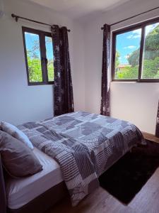 Postel nebo postele na pokoji v ubytování Cool Breeze VIlla No 1 Grand Baie