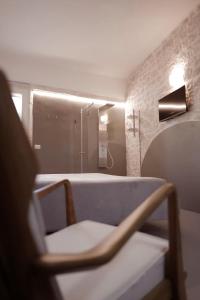 Ένα ή περισσότερα κρεβάτια σε δωμάτιο στο Pepenero Apulian Rooms