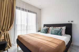 Voodi või voodid majutusasutuse Casino & Mall Luxury Jacuzzi Penthouse Suite toas