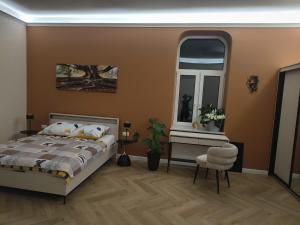 Ένα ή περισσότερα κρεβάτια σε δωμάτιο στο Apartament Cherry