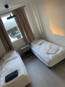 Ένα ή περισσότερα κρεβάτια σε δωμάτιο στο Beautiful single home in Höfn +5 φωτογραφίες