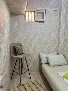 Una cama o camas en una habitación de Dar Oussama