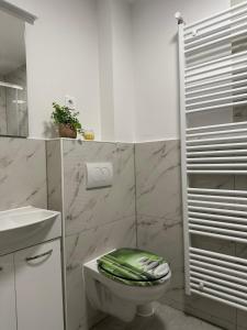 Koupelna v ubytování Apartma Center Ljutomer + 11 fotografií