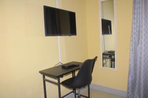 Μια τηλεόραση ή/και κέντρο ψυχαγωγίας στο Blue Ridge Escape Guest House