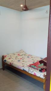 Ένα ή περισσότερα κρεβάτια σε δωμάτιο στο His Grace Beach Avenue & Camping - Malpe Beach