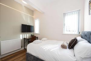 Ένα ή περισσότερα κρεβάτια σε δωμάτιο στο The Groves Room 2 First Floor