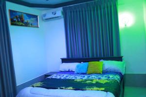 Ένα ή περισσότερα κρεβάτια σε δωμάτιο στο Erliz villa