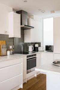 Køkken eller tekøkken på Seven Space - The City Haven + 8 billeder