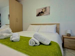 Ένα ή περισσότερα κρεβάτια σε δωμάτιο στο BelHome