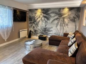 Χώρος καθιστικού στο Fécamp, Etretat, Yport, joli appartement tout près de la plage et de la gare, vous pouvez me contacter sur Les gîtes de SoleilMapou