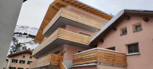 a house under construction with the roof up at Bergnest 4 in Bivio