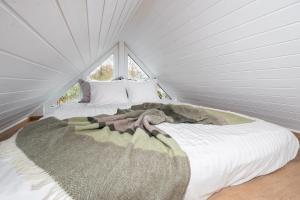 Postel nebo postele na pokoji v ubytování Private small house with sauna and terrace