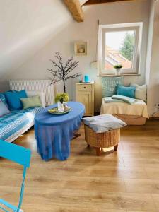 Posezení v ubytování Appartement mit Panoramablick über Aschaffenburg