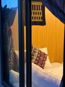 Ένα ή περισσότερα κρεβάτια σε δωμάτιο στο Bản Sù +5 φωτογραφίες