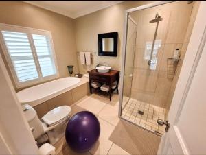 Koupelna v ubytování Peaches Property + 11 fotografií