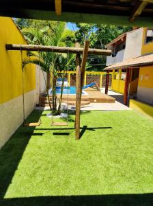 Zahrada ubytování Loft Lindo e completo próximo à praia