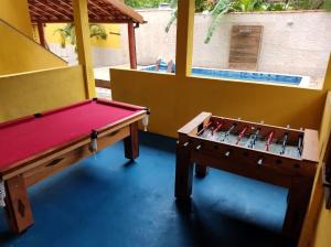 Biliár nebo kulečník v ubytování Loft Lindo e completo próximo à praia