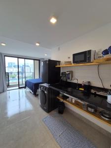 Kuchyň nebo kuchyňský kout v ubytování Studio A7-B Vista Incrível com piscina