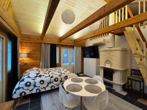 Postel nebo postele na pokoji v ubytování Villa Tourula + 5 fotografií