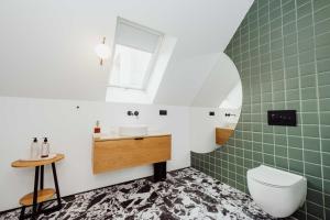 Ένα μπάνιο στο Grodzka Stare Miasto Aparthotel - Dream Apart