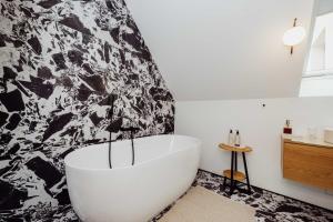 Ένα ή περισσότερα κρεβάτια σε δωμάτιο στο Grodzka Stare Miasto Aparthotel - Dream Apart +49 φωτογραφίες