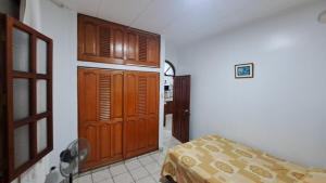 Ένα ή περισσότερα κρεβάτια σε δωμάτιο στο Departamento Familiar