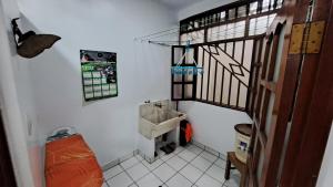 Ένα ή περισσότερα κρεβάτια σε δωμάτιο στο Departamento Familiar +3 φωτογραφίες