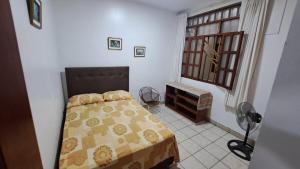 Ένα ή περισσότερα κρεβάτια σε δωμάτιο στο Departamento Familiar