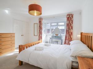 Postel nebo postele na pokoji v ubytování 32 Abbey Gardens