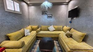 Posezení v ubytování Eco Farm Tayssir Marrakech