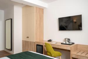 Η κουζίνα ή μικρή κουζίνα στο Hotel Epica