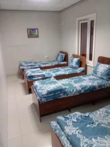 Ένα ή περισσότερα κρεβάτια σε δωμάτιο στο Alo Mutal hostel