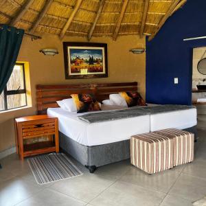 Postel nebo postele na pokoji v ubytování Mountain Aloe Den