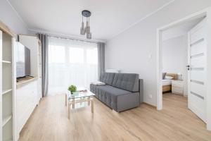Χώρος καθιστικού στο Poezji Gliwice Modern&Bright Apartment with Balcony by Noclegi Renters