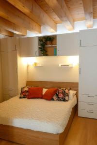 Postel nebo postele na pokoji v ubytování Casa Giorgia Collio Suite