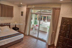 Postel nebo postele na pokoji v ubytování Mooni Sunshine Villa + 71 fotografií