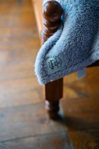a close up of a wooden leg of a bed at Henllys Estate B and B in Llandovery +70 photos
