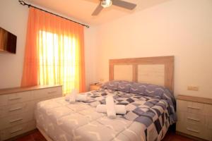 Ένα ή περισσότερα κρεβάτια σε δωμάτιο στο Apartalux Vera Palace