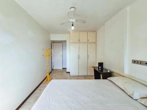 Ένα ή περισσότερα κρεβάτια σε δωμάτιο στο Ondina Vista Mar 733 +14 φωτογραφίες