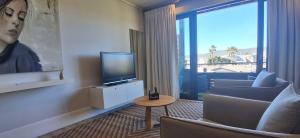 TV a/nebo společenská místnost v ubytování Luxury Studio 106