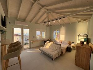 Postel nebo postele na pokoji v ubytování Anemeli studio