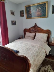 Ένα ή περισσότερα κρεβάτια σε δωμάτιο στο Le terrier des sorciers +13 φωτογραφίες