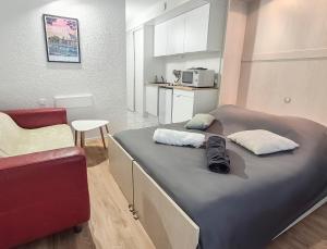 Postel nebo postele na pokoji v ubytování Studio affaires et détente proche Nantes