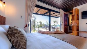 Postel nebo postele na pokoji v ubytování InHouse Glamping Hotel La Paz + 172 fotografií