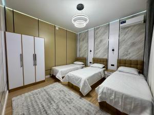 Postel nebo postele na pokoji v ubytování Town House