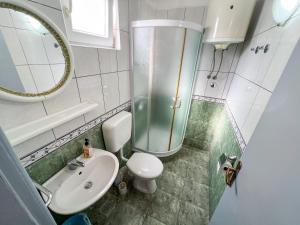 Koupelna v ubytování Apartments Natalika + 66 fotografií
