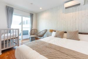 Postel nebo postele na pokoji v ubytování Grandioso Okinawa Villa Kin 2 - Vacation STAY 37331v + 31 fotografií