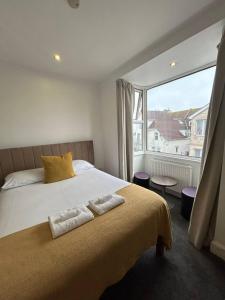 Postel nebo postele na pokoji v ubytování Reef Lodge + 33 fotografií