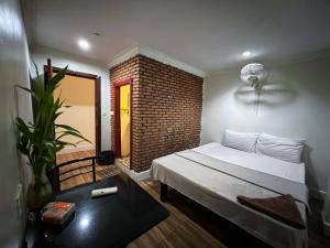 Postel nebo postele na pokoji v ubytování Moon Ratanak