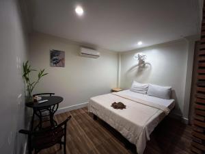 Postel nebo postele na pokoji v ubytování Moon Ratanak